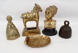 Brass model of a horse, brass bust of a lady, brass tray, brass bell and two iron bells, stamp