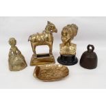 Brass model of a horse, brass bust of a lady, brass tray, brass bell and two iron bells, stamp