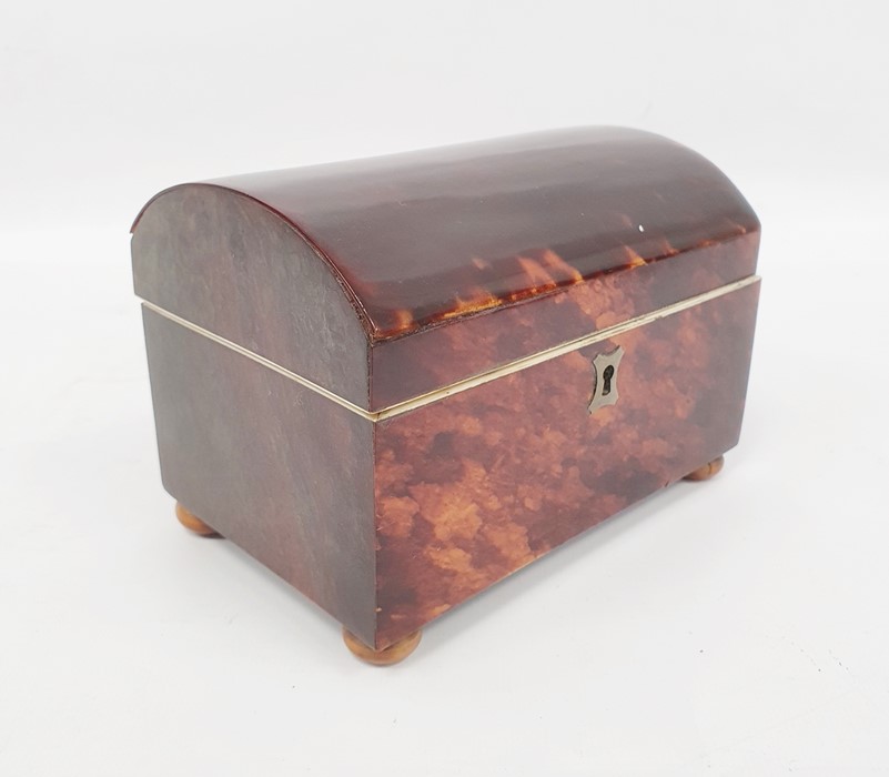 A 19th century tortoiseshell tea caddy, domed lid, ivory rim and handles, silvered escutcheon, on