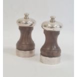 Pair of turned wooden pepper grinders with silver mounts by M C Hersey & Son Ltd, London 1993,