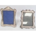 Edwardian silver mounted photograph frame, rectangular with scroll and floral repousse detail,