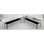 Two mid century coffee tables, the rectangular tops with printed decoration, on black-coloured