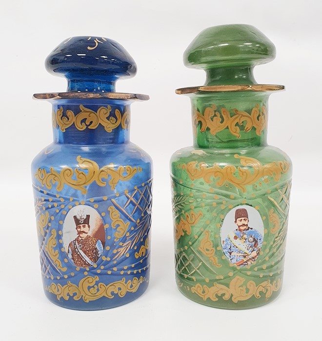 Pair possibly Bohemian stoppered glass bottles with gilt decoration and roundels, depicting