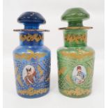 Pair possibly Bohemian stoppered glass bottles with gilt decoration and roundels, depicting