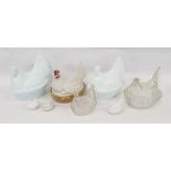 Assorted glass hen egg crocks and one porcelain example
