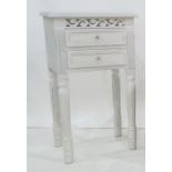 Modern painted bedside table fitted with two short drawers, with carved decoration, 40cm wide