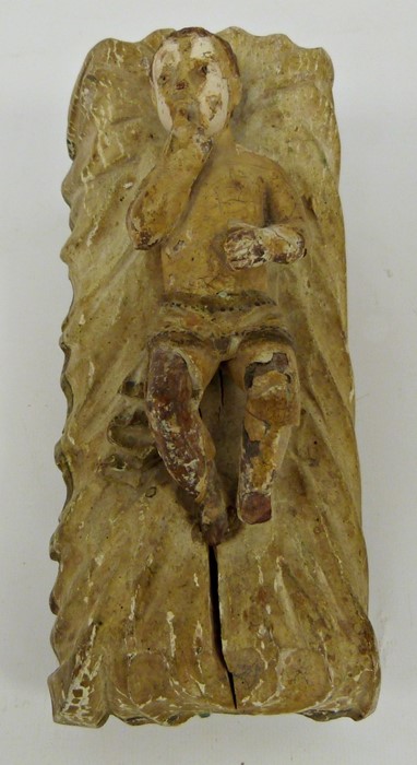 Carved wood and gesso figure of child on bed, worn polychrome finish, probably Italian, possibly