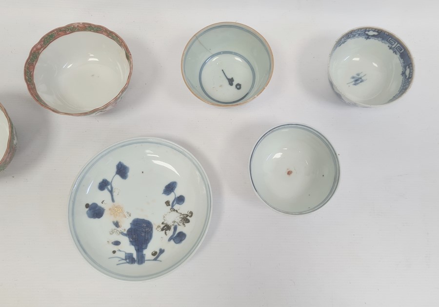 Three Chinese porcelain tea bowls with blue landscape and plant decoration, similar saucer and a set - Image 2 of 11