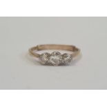 9ct gold three-stone diamond ring, the central stone 4mm diameter approx, flanked by 2mm stones, 1.