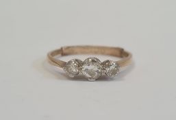 9ct gold three-stone diamond ring, the central stone 4mm diameter approx, flanked by 2mm stones, 1.