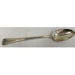 An 18th century silver serving spoon, monogramed handle, London makers mark TE over GS, 3toz.