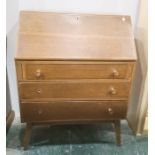 Oak bureau by Fineline Furniture, the fall-front over three long drawers, 77cm wide