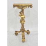 Modern gilt-finish occasional table, the shaped top with moulded rococo-style frieze, the pedestal