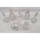 Assorted decanters and pedestal bowl with grape and vine decoration, square base