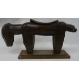 20th century Senufo carved wooden stool in the form of a dog, 34cm high, on rectangular metal