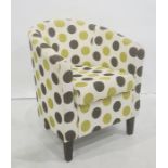 Modern green and black spotted tub chair