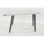 Mid 20th century tile pebble top shaped coffee table on four ebonised supports, to brass caps,