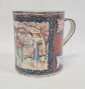 Chinese porcelain mug, cylindrical, painted in reserve with figures and a baby before lakeside