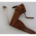 Glass hunting flask in brown leather holster  Condition ReportCork seal is perished. Some minor