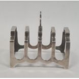 A 1940s silver toast rack, with trefoil shaped handle, Birmingham 1940, maker William Suckling