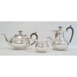 A 1920s matched three-piece silver teaset, reeded and repousse floral decoration to edges, claw