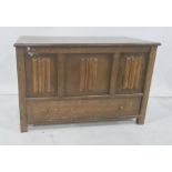 20th century oak blanket box, the rectangular top above the linenfold decorated front, single drawer