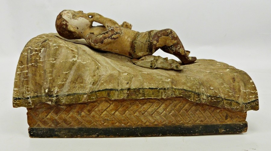 Carved wood and gesso figure of child on bed, worn polychrome finish, probably Italian, possibly - Image 2 of 4