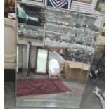Modern rectangular wall mirror of plain form with bevelled panels, 76 x 107cm