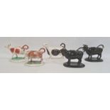 Pair Jackfield-style pottery cow creamers, black glazed and three others, various (5)