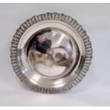 A 1930s Eygptian silver circular dish, pierced leaf border, marked to base 900 and date letter L,