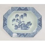 Chinese porcelain shallow dish, oblong with canted corners, willow and lotus design in blue and with