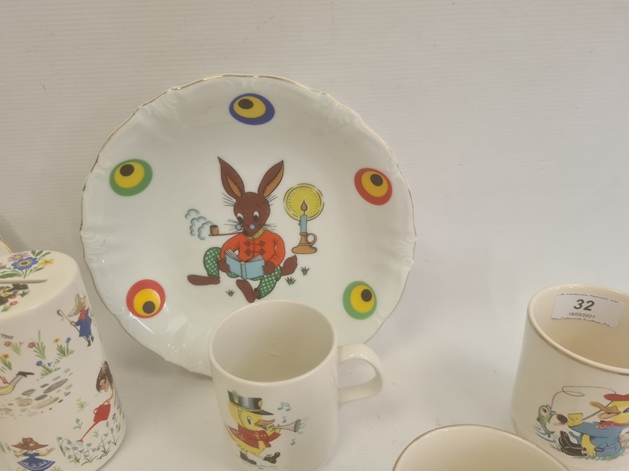 Collection of nurseryware pottery mugs, circa 1930 and later, variously printed and painted with - Image 4 of 12