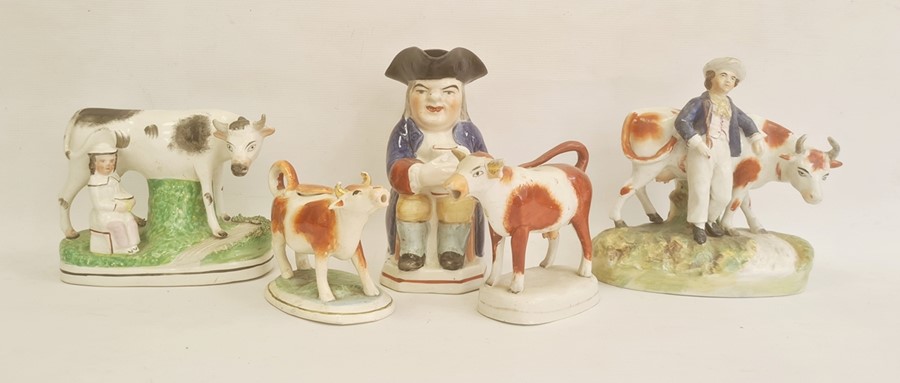 19th century collection of Staffordshire pottery comprising a Toby jug, 21.5cm high, a farmer with