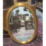 Modern oval mirror in gilt-effect moulded frame, 81cm x 60cm