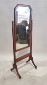 20th century oak cheval mirror, the rectangular plate with canted top corners, 143cm high