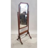 20th century oak cheval mirror, the rectangular plate with canted top corners, 143cm high