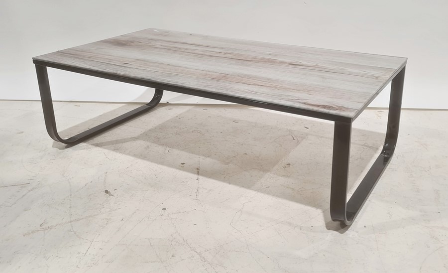 Glass-topped rectangular coffee table on black metal base, 104.5cm wide - Image 2 of 2