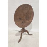 19th century oak circular snap top occasional table on turned column, tripod supports