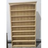 Cream painted open eight-shelf pine bookcase, 117cm x 204cm