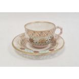 Royal Worcester porcelain reticulated cabinet cup and saucer with gilt landscape and jewelled