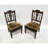 Pair of 19th century low chairs with carved and pierced backsplats, overstuffed seats, turned