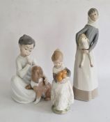 Lladro porcelain group of boy in nightshirt with puppy, 20cm high, Lladro girl with lamb and another