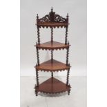 19th century walnut four-tier corner whatnot on barleytwist supports, 122cm high  Condition