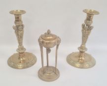 Pair antique ornate copper candlesticks, each with quadruple caraytid column, mask and scroll