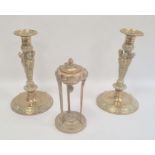 Pair antique ornate copper candlesticks, each with quadruple caraytid column, mask and scroll