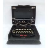 Corona black metal typewriter inscribed L C Smith & Corona Typewriters Ltd, Aldwych, London in