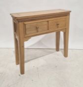 20th century oak hall table, the rectangular top with rounded front corners, above two drawers, on