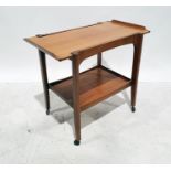 Mid-century designer two-tier teak tea trolley, on castors, 78.5cm wide