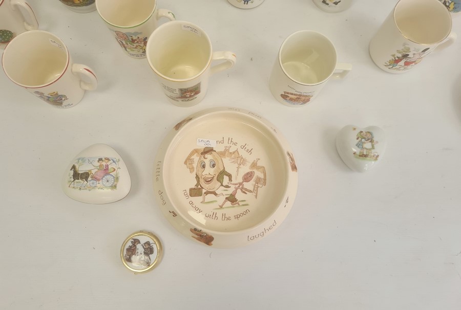 Collection of nurseryware pottery mugs, circa 1930 and later, variously printed and painted with - Image 2 of 12