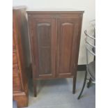 19th century mahogany cupboard, the square top above two-panelled door opening to reveal shelves, on